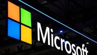 In this file photo taken on March 02, 2022 a Microsoft logo is displayed at the MWC (Mobile World Congress) in Barcelona. (Photo by Josep Lago / AFP)

