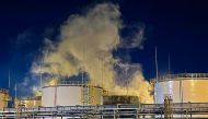 This handout image posted on May 4, 2023 on the official Telegram account of Krasnodar Krai governor Veniamin Kondratyev shows smoke rising from a fire at an oil refinery in the southern Krasnodar region's Ilsky settlement. Photo by Handout / TELEGRAM / @kondratyevvi / AFP