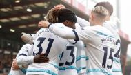 :Chelsea's English midfielder Conor Gallagher (C) celebrates with teammates scoring his team's first goal during the English Premier League football match between Bournemouth and Chelsea at the Vitality Stadium in Bournemouth, southern England on May 6, 2023. (Photo by Ian Kington / AFP) 