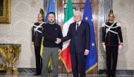 This handout picture taken and released by the Ukrainian Presidential Press Service on May 13, 2023, shows Italian President Sergio Mattarella shaking hands with Ukrainian President Volodymyr Zelensky before their meeting at the Quirinale presidential palace in Rome. (Photo by STRINGER / Ukrainian Presidential Press Service / AFP) 
