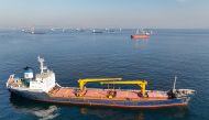 File Photo: The Joint Coordination Centre officials board cargo ship Mehmet Bey as she waits to pass the Bosphorus strait off the shores of Yenikapi during a misty morning in Istanbul, Turkey, on October 31, 2022. (Mehmet Emin Calsikan/Reuters)