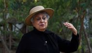 In this picture taken on May 4, 2023, architect Yasmeen Lari, the head of Heritage Foundation of Pakistan, speaks during an interview with AFP at her garden in Karachi. (Photo by Asif Hassan / AFP)