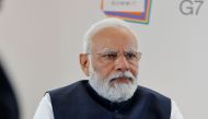 India's Prime Minister Narendra Modi attends a bilateral meeting with France's President Emmanuel Macron (not pictured) on the sidelines of the G7 Leaders' Summit in Hiroshima on May 20, 2023. (Photo by Ludovic Marin / POOL / AFP)