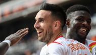 Lens' French forward Adrien Thomasson (C) celebrates after scoring his team's second goal during the French L1 football match between FC Lorient and RC Lens at Stade du Moustoir in Lorient, western France on May 21, 2023. (Photo by JEAN-FRANCOIS MONIER / AFP)