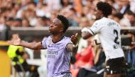 Real Madrid's Brazilian forward Vinicius Junior reacts during the Spanish league football match between Valencia CF and Real Madrid CF at the Mestalla stadium in Valencia on May 21, 2023. (Photo by Jose Jordan / AFP)