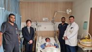 Korean Ambassador to Qatar, HE Lee Joon-ho (second left) with the rescued Korean national (center) along with the Hamad Medical team