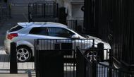 A car that was driven into the gates of 10 Downing Street, the official residence of Britain's Prime Minister, is pictured in central London on May 25, 2023. (Photo by JUSTIN TALLIS / AFP)