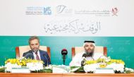 Director-General of General Endowment Department Dr. Sheikh Khalid bin Mohammed bin Ghanem Al Thani and Dean of the College of Islamic Studies of HBKU Dr. Recep Senturk addressing a press conference at the headquarters yesterday.