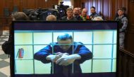 Jailed Russian opposition leader Alexei Navalny is seen on a screen during a court hearing in Moscow. (Reuters file photo)
