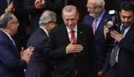 Turkish President Recep Tayyip Erdogan gestures while he attends the 28th term deputies' oath-taking ceremony at the Turkish Grand National Assembly in Ankara, Turkey on June 02, 2023. (Photo by Adem Altan / AFP)
