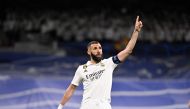 Real Madrid's French forward Karim Benzema celebrates scoring his team's first goal during the UEFA Champions League quarter final first leg football match between Real Madrid CF and Chelsea FC at the Santiago Bernabeu stadium in Madrid on April 12, 2023. Photo by JAVIER SORIANO / AFP