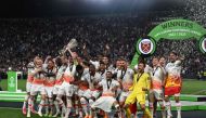 West Ham players including English midfielder Declan Rice (C) celebrate with the trophy after winning the UEFA Europa Conference League final football match between ACF Fiorentina and West Ham United FC in Prague, Czech Republic on June 7, 2023. (Photo by Michal CIZEK / AFP)