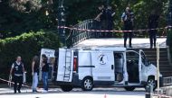 Investigators of the judicial police work at the scene of a stabbing attack in a the 'Jardins de l'Europe' parc in Annecy, French Alps, on June 8, 2023. Photo by OLIVIER CHASSIGNOLE / AFP