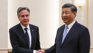 US Secretary of State Antony Blinken (L) shakes hands with China's President Xi Jinping at the Great Hall of the People in Beijing on June 19, 2023. (Photo by Leah MILLIS / POOL / AFP)