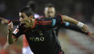 hen Benficaｴs Argentinian midfielder Angel Di Maria celebrates after scoring against Leixoes during their Portuguese league football match at the Mar Stadium in Leixoes, on February 27, 2009. Argentinian Angel Di Maria has signed up with Benfica, returning to a club with which he played when he arrived in Europe, the Portuguese club announced on its website on July 5, 2023. (Photo by Miguel RIOPA / AFP)