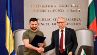 Ukrainian President Volodymyr Zelensky (left) with Bulgaria's Prime Minister Nikolai Denkov, after signing a memorandum prior to their joint press conference in Sofia, on July 6, 2023. (Photo by Nikolay Doychinov / AFP)