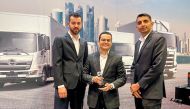 Officials of Milaha with the 'Hino Sales Achievement Award'.