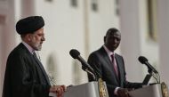 Iranian President Ebrahim Raisi (L) attends a press conference alongside Kenyan President William Ruto (R) at the State House in Nairobi on July 12, 2023. (Photo by SIMON MAINA / AFP)