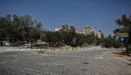 The pedestrian zone near Athens' most visited archaeological site, the Acropolis, is empty of tourists and residents as the country is hit by a new heatwave, on July 20, 2023. (Photo by Louisa Gouliamaki / AFP)