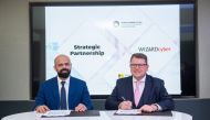 Officials of Mannai and Wizardcyber during the sign ceremony.