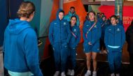 Australian players look out at the rain as they arrive at the Rectangular Stadium in Melbourne on July 30, 2023, on the eve of the Women's World Cup football match between Australia and Canada. (Photo by William WEST / AFP)