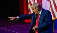 Former US President and 2024 hopeful Donald Trump points to the crowd after speaking during the Alabama Republican Party's summer dinner in Montgomery, Alabama, on August 4, 2023. (Photo by Elijah Nouvelage / AFP)
