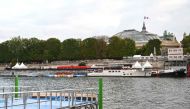 This photograph taken on August 6, 2023 shows the tempory venue to host a pre-Olympic swimming test competition on the river Seine in Paris. Photo by Bertrand GUAY / AFP