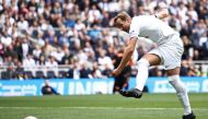 (FILES) Tottenham Hotspur's English striker Harry Kane shoots to score his third goal during the pre-season friendly football match between Tottenham Hotspur and Shakhtar Donetsk at the Tottenham Hotspur Stadium, in London, on August 6, 2023. (Photo by HENRY NICHOLLS / AFP)
