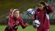 Spain's players Alexia Putella (L) and Salma Paralluelo (2nd R) take part in a training session at the North Harbour Stadium in Auckland on August 13, 2023. (Photo by Saeed Khan / AFP)
