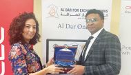 Mohammed Amgad, Deputy CEO, Al Dar For Exchange Works with Hanane El Mir, senior director, SMB, Middle East, Turkey, and Africa, Oracle Cloud Infrastructure.