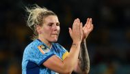 England's defender #06 Millie Bright celebrates their victory at Stadium Australia in Sydney on August 16, 2023. (Photo by Steve Christo / AFP)