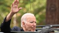 US President Joe Biden waves as he departs from Our Lady of Tahoe Catholic Church in Zephyr Cove, Nevada on August 19, 2023. Photo by Mandel NGAN / AFP