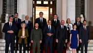 (Front row L-R) President of Serbia Aleksandar Vucic, European Commission President Ursula von der Leyen, Ukraine's President Volodymyr Zelensky, Greece's Prime Minister Kyriakos Mitsotakis, European Council President Charles Michel, President of Moldova Maia Sandu, President of Montenegro Jakov Milatovic, (Back row L-R) President of Romania Marcel Ciolacu, Prime Minister of North Macedonia Dimitar Kovacevski, Prime Minister of Croatia Andrej Plenkovic, Prime Minister of Kosovo Albin Kurti, Chairwoman of the Council of Ministers of Bosnia and Herzegovina, Borjana Kristo and Prime Minister of Bulgaria Nikolai Denkov pose for a family photo outside the Maximos mansion in Athens, on August 21, 2023, during an informal meeting of Balkan leaders with top European Union officials. (Photo by Aris Messinis / AFP)