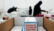 (Files) Boxes containing the Moderna Covid-19 vaccine are prepared to be shipped at the McKesson distribution center in Olive Branch, Mississippi, on December 20, 2020. (Photo by Paul Sancya / POOL / AFP)