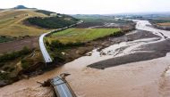 An aerial view taken on September 7, 2023 shows a destroyed bridge in a flooded area in the city of Karditsa, central Greece. Photo by Eurokinissi / AFP)
