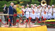 US President Joe Biden attends a welcoming ceremony hosted by Vietnam's Communist Party General Secretary Nguyen Phu Trong (2L) at the Presidential Palace of Vietnam in Hanoi on September 10, 2023. (Photo by Saul Loeb / AFP)