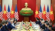 US President Joe Biden and Vietnam's Communist Party General Secretary Nguyen Phu Trong (5R) hold a meeting at the Communist Party of Vietnam Headquarters in Hanoi on September 10, 2023. (Photo by Saul Loeb / AFP)