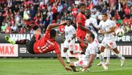 Rennes' French midfielder #11 Ludovic Blas (L) shoots the ball during the French L1 football match between Stade Rennais FC and Lille LOSC at The Roazhon Park Stadium in Rennes, western France on September 16, 2023. (Photo by Sebastien SALOM-GOMIS / AFP)
