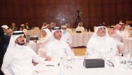 President of Ashghal H E Dr. Eng. Saad bin Ahmed Al Muhannadi (right) with other officials during the symposium. 