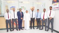 Gulf Exchange officials during the inauguration of its 14th branch in Umm Slal Mohammed.