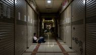 Shops in Southeast Asia's largest textile shopping center are closed and some were even leased and resold at Tanah Abang Market in Jakarta on September 27, 2023. (Photo by Bay Ismoyo / AFP)