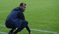 In this photograph taken on December 29, 2019 France national team player Paul Pogba poses on the pitch prior to a football match between All Star France and Guinea at the Vallee du Cher Stadium in Tours, central France, as part of the 