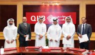 QIIB Chief Executive Officer, Dr Abdulbasit Ahmad Al Shaibei, with employees honoured for the year 2022 at the bank’s main headquarters.