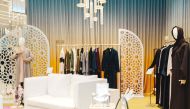 The exhibition presents a diverse range of abayas.
