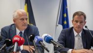 Brussels' public prosecutor Tim De Wolf (right) and Brussels' general prosecutor Johan Delmulle look on during a press conference in Brussels, October 22, 2023. (Photo by Nicolas Maeterlinck / Belga / AFP)