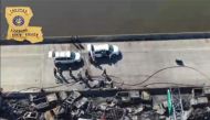 This still image obtained from a handout video released by the Lousiana State Police on Facebook shows burned vehicles after a fire erupted following a crash on Interstate 55 highway in St. John the Baptist Parish, Louisiana, on October 23, 2023. Photo by Louisiana State Police / AFP