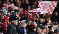 Forrest fans cheers their team during the English Premier League football match between Nottingham Forest and Aston Villa at The City Ground in Nottingham, central England, on November 5, 2023. (Photo by Paul ELLIS / AFP)