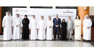QU President Dr. Omar Al Ansari (fifth left) and other officials at the awards ceremony. 