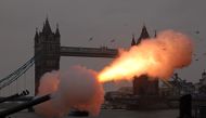 Members of the Honourable Artillery Company fire a 62 Gun Royal salute, for the King's 75th Birthday from Tower Wharf, by Tower Bridge in central London, November 14, 2023. (Photo by Daniel Leal / AFP)