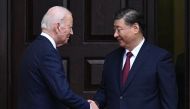 US President Joe Biden greets Chinese President Xi Jinping before a meeting during the Asia-Pacific Economic Cooperation (APEC) Leaders' week in Woodside, California on November 15, 2023. (Photo by Brendan SMIALOWSKI / AFP)
